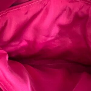 NWOT Betsy Johnson black quilted purse with pink interior